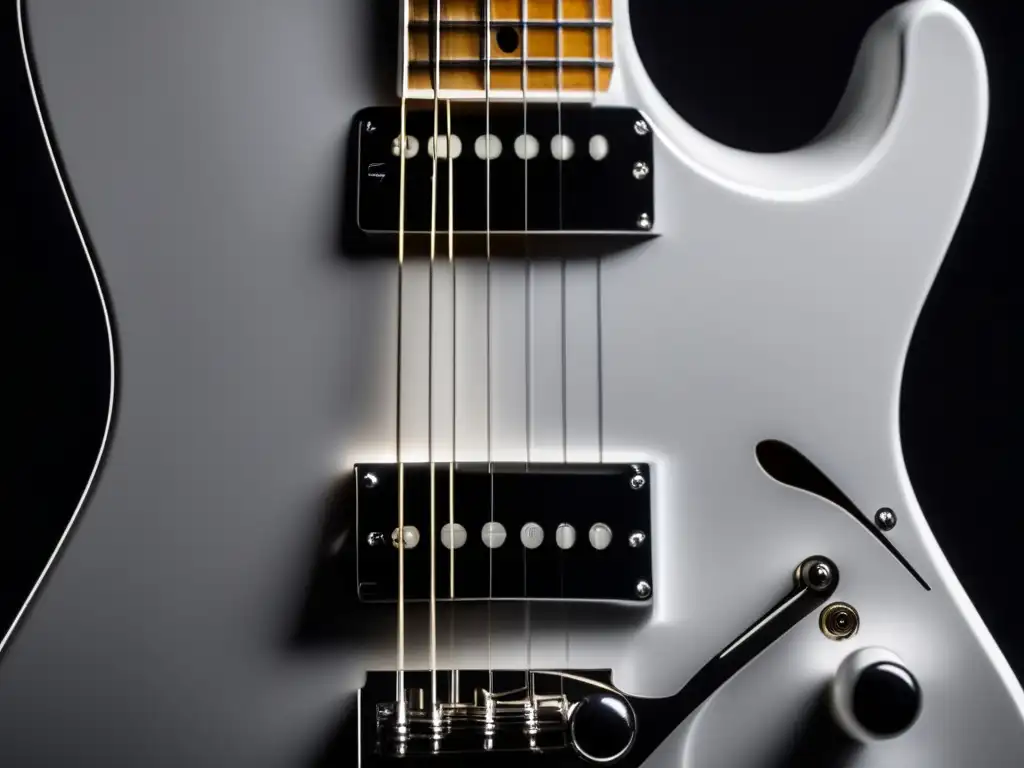 A closeup of a sleek white electric guitar, set against a black backdrop